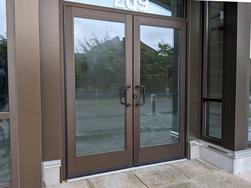 Maximizing Energy Efficiency with Custom Commercial Doors and Window